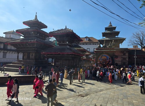 Tourists and locals exploring the historic courtyards and temples of Kathmandu Durbar Square, a UNESCO World Heritage Site showcasing Nepal’s rich Newar architecture and vibrant culture.